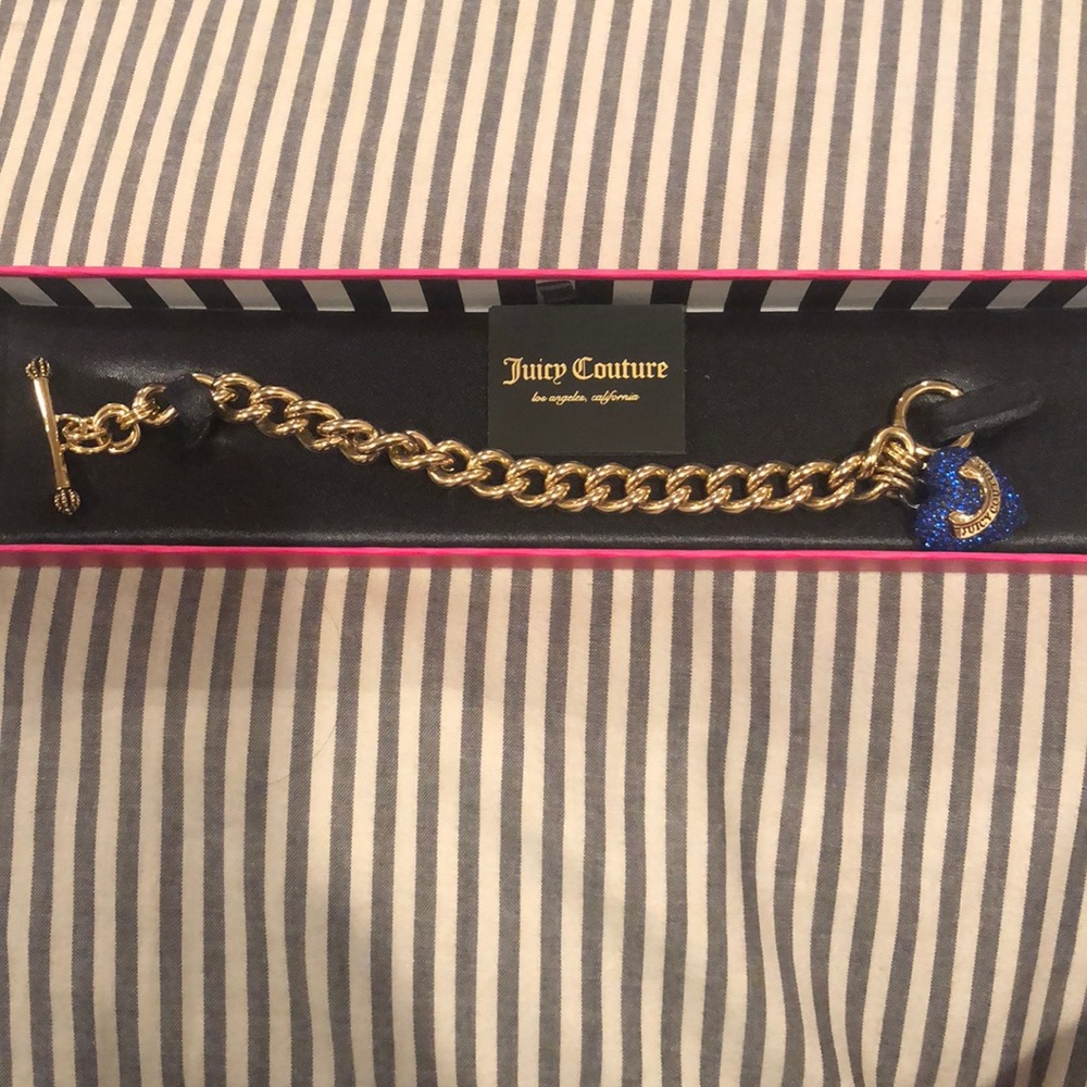 Gold Juicy Couture bracelet with blue stones